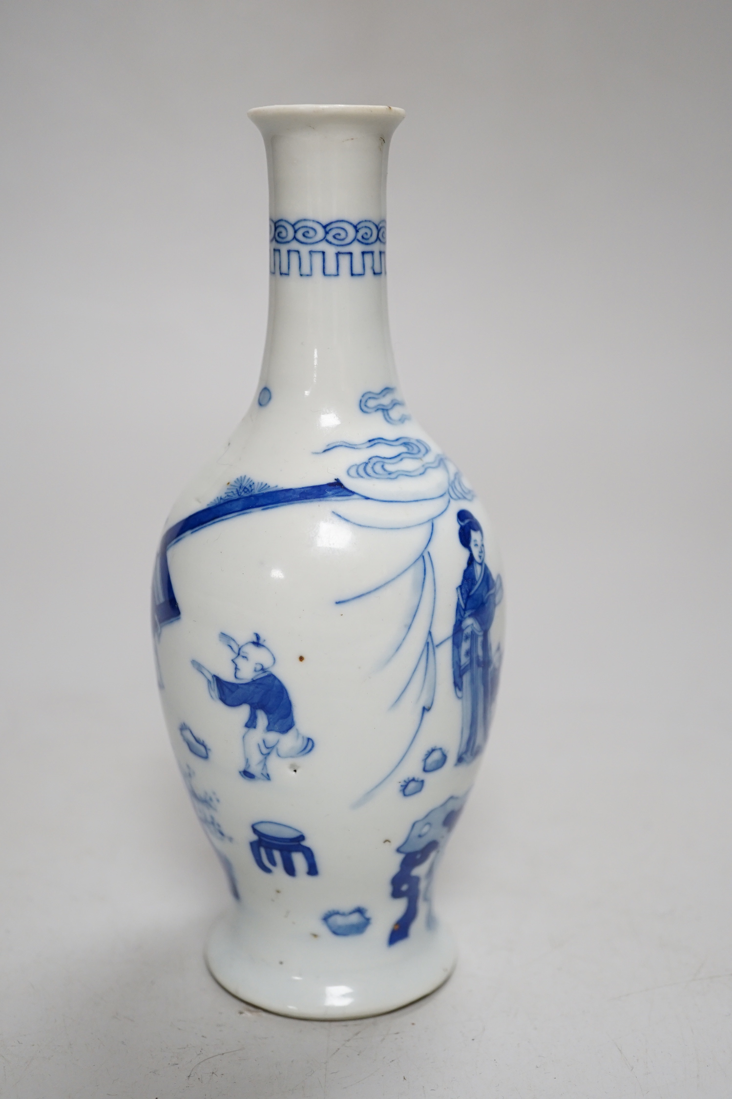 A small Chinese blue and white bottle vase, 17cm high